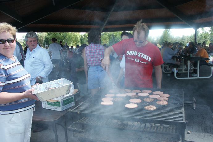 Students helping to prepare food.