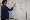 Dr. Powers teaching at a white board.